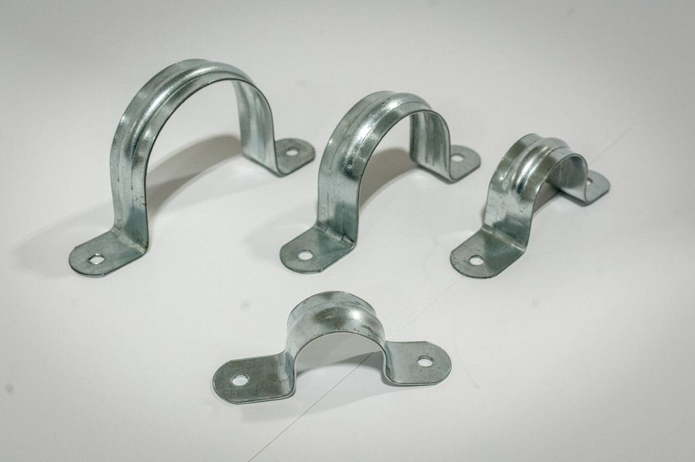 Pipe straps on a white background